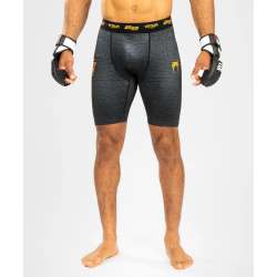 Venum ares 2.0 compression shorts black gold